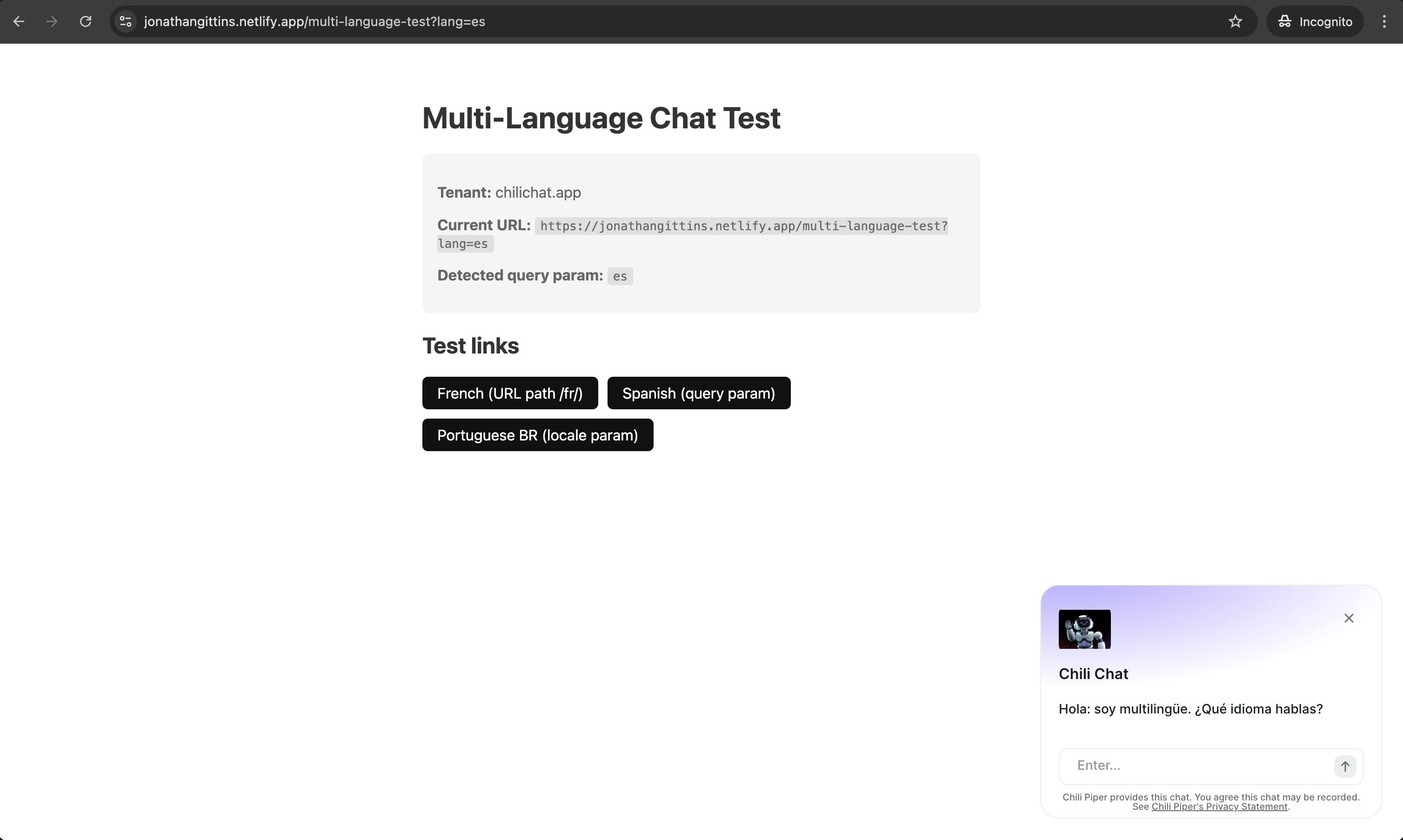 Chat widget showing Spanish greeting with ?lang=es