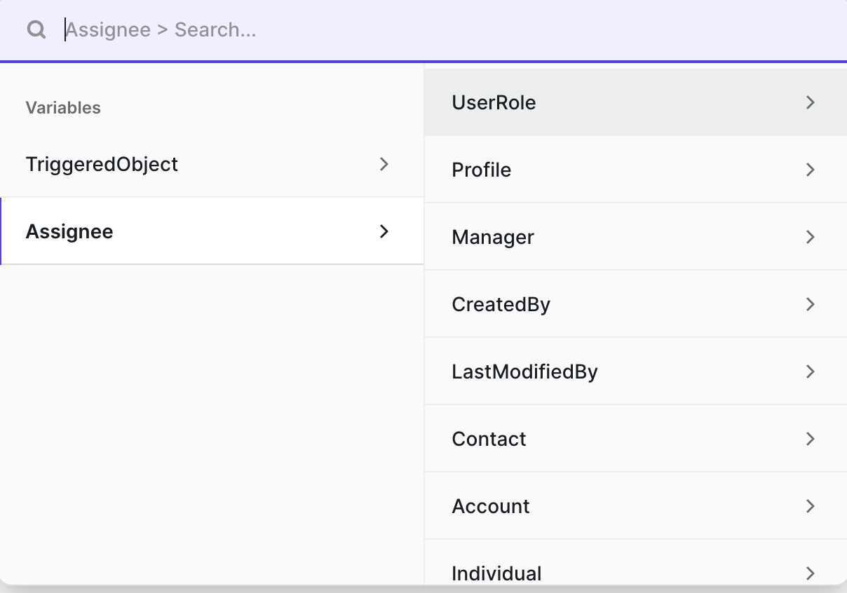 Variable picker open at Variables → Assignee, showing the User lookups
